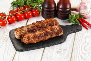 Chicken kebab minced meat and spices photo