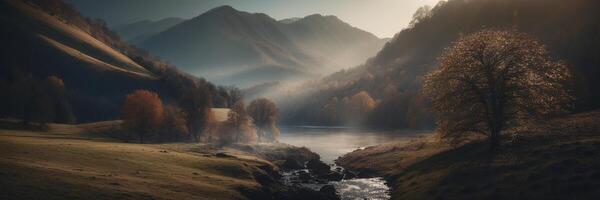A river runs through a valley with trees and mountains photo