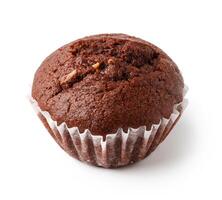 Chocolate muffin baked to perfection, displayed on a white background ready for serving or enjoying as a delightful treat photo