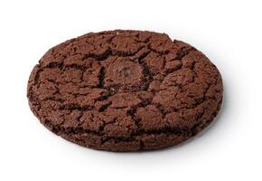 Freshly baked chocolate cookie with a rich texture and deep brown color sitting on a plain background photo