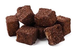 Delicious dark chocolate cubes stacked on a white background ready for dessert or snacking photo