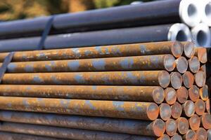 Steel reinforcement bars stacked in a stack. Copy space photo