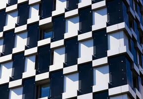 Facade of a modern building in black and gray. Copy space photo