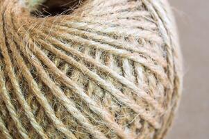 Texture of the brown natural rustic hemp cord in roll photo