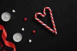 Hearts and candles on a dark background. The concept of celebrating Valentine's Day, Mother's Day photo