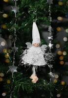 Christmas card with toys, fir branches and a garland.Decor with sweets, cinnamon. photo