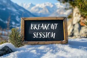 Breakout session message written on chalkboard on snow photo