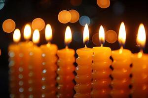 Burning candles in a dark room during a religious celebration photo