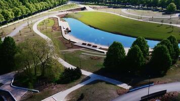 Curved Water Feature in a Well Designed Park with Pathways video
