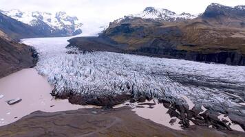 Icelandic Glacier with Crevasses and Icebergs in Glacial Lagoon video