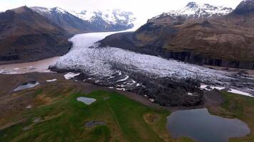 Vatnajokull Glacier with Volcanic Mountains and Snow Capped Peaks video