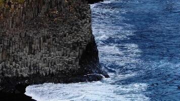 Basalt Columns at Reynisfjara Beach Meeting the North Atlantic Ocean video