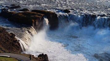 Godafoss Waterfall with Viewing Platform in Iceland's Rugged Terrain video