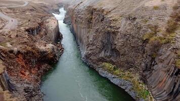 Studlagil Basalt Canyon with Vertical Columns and River in Iceland video