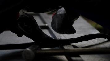 Close Up of Welder at Work in Industrial Workshop Setting video
