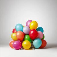 Colorful balloons in vibrant arrangement create festive atmosphere, perfect for celebrations and parties. Their cheerful hues evoke joy and excitement photo