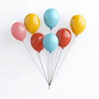 Colorful balloons in various shades floating against white background, creating festive and cheerful atmosphere. Perfect for celebrations and events photo