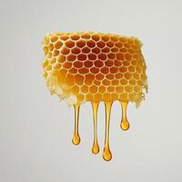 piece of honeycomb with golden honey dripping from it, set against neutral background, showcasing natural texture and rich color of honey photo