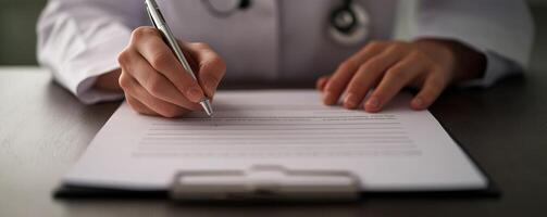 Laws and regulations healthcare concept. Doctor signing a document on a clipboard. photo