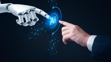 A robot hand touching the ai button on a black background photo