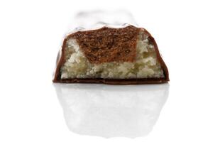 Delightful chocolate confection reveals smooth, creamy filling surrounded by a rich outer layer photo