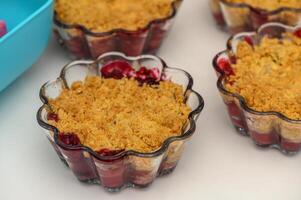 Delightful cherry crumble cups baked to perfection with a golden topping and rich berry flavor photo