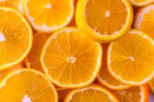Bright and refreshing citrus slices stacked together in a vibrant pattern photo