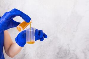 Close-up of a doctor gloves working in a testing laboratory photo