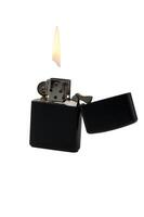 Sleek black lighter with flame illuminating dark surroundings at night in a cozy gathering photo