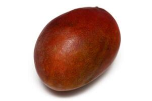 Unique tropical fruit with reddish-brown skin displayed on a white background for culinary exploration photo