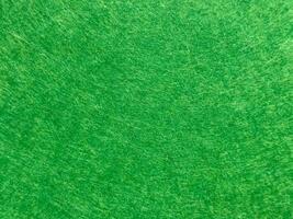 Close up of vivid green textured surface with circular patterns photo