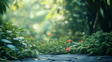 Lush green forest with a path leading through it. The path is lined with red flowers and green plants photo