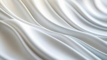 White fabric with a wave pattern. The fabric is smooth and shiny. The wave pattern is very detailed and looks like it's made of many small lines photo