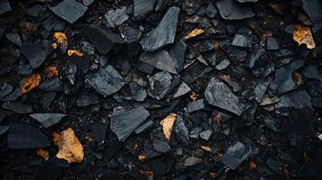 Black and orange background with a lot of rocks. The rocks are scattered all over the background photo