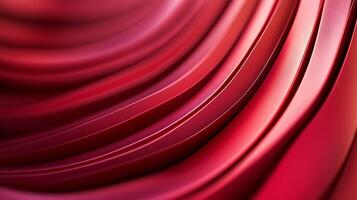 Red ribbon with a red background. The ribbon is long and curvy photo