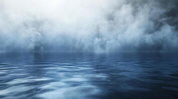 Cloudy sky with a body of water in the foreground. The water is calm and the sky is overcast photo