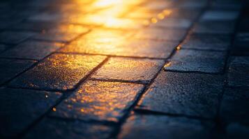 Close up of a wet sidewalk with a yellow light shining on it. The light is reflecting off the wet surface, creating a beautiful and serene atmosphere photo
