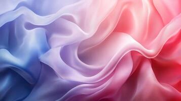 Colorful piece of fabric with a blue, pink, and purple hue. The fabric is folded and has a wave-like pattern. The colors and pattern create a sense of movement and energy photo