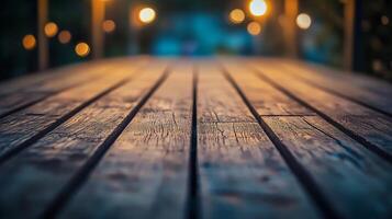 Wooden deck with a view of the night sky. The deck is empty and the lights are on, creating a warm and inviting atmosphere photo