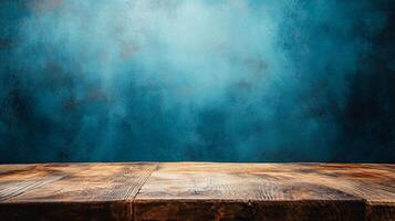Wooden table with a blue background. The table is empty. The blue background gives a calm and peaceful mood to the image photo