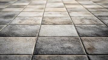 Tile floor with a grey and white color scheme. The tiles are arranged in a square pattern photo
