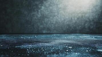 Dark blue background with a light blue water. The water is full of glitter. The background is empty and the water is calm photo
