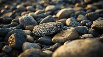 Close up of a pile of rocks with a few large ones in the foreground. The rocks are of various sizes and colors, and the overall mood of the image is calm and serene photo