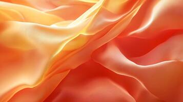 The image is of a piece of orange fabric with a pattern that resembles a wave. The fabric is folded and has a rough texture, giving it a sense of movement and energy photo