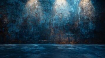 Large, empty room with three bright lights shining on a blue wall. The room is dimly lit, creating a moody atmosphere. The blue wall is covered in graffiti, giving the space a gritty, urban feel photo