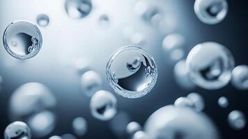 Series of small, clear, and shiny spheres floating in the air. The spheres are scattered throughout the scene, with some closer to the foreground and others further in the background photo