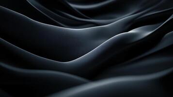 Black and white image of a piece of fabric with a pattern. The image is abstract and has a moody, mysterious feel to it photo