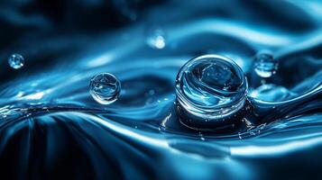 Blue body of water with a single drop of water in the middle. The drop is surrounded by other drops of water, creating a sense of movement and fluidity photo