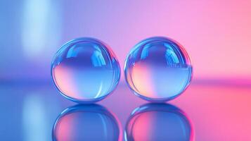 Two blue spheres are reflected in a blue surface. The spheres are surrounded by a purple background. The image has a calm and serene mood photo