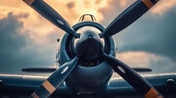 Close up of the propeller of an airplane. The image has a mood of nostalgia and a sense of adventure photo